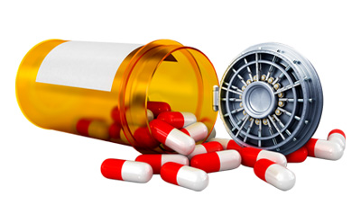 一瓶散落的红色和白色胶囊。