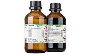 Two amber glass bottles with white labels, featuring black text and green accents, capped with black lids, against a white background, typically used for pharmaceuticals or chemical reagents.. Aquastar® Reagents for Volumetric Karl Fischer Titration