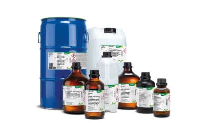  A collection of chemical containers, including a blue drum, a white jerrycan, and several brown glass bottles, all labelled with safety information and branding from Supelco.