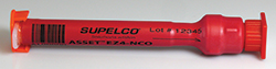 A red cylindrical object with black measurement markings. It is labeled “SUPELCO” along with “Lot 12345” and “ASSET FRANCE”.